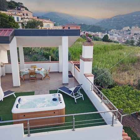 Loft incantevole con idromassaggio esterno privato Patti Esterno foto